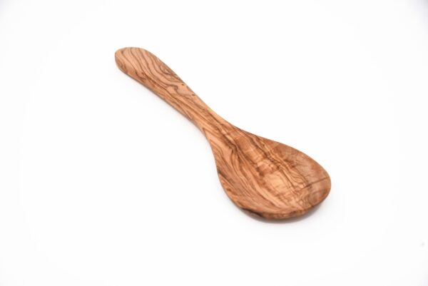 A large olive wood cooking spoon